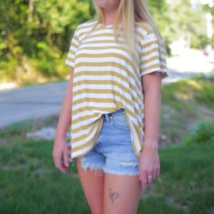 White and yellow striped top